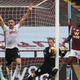 Oliver McBurnie and Jack Robinson of Sheffield United appeal for a goal which is later denied as Orjan Nyland of Aston Villa catches the ball during the Premier League match on Wednesday. Image: Getty